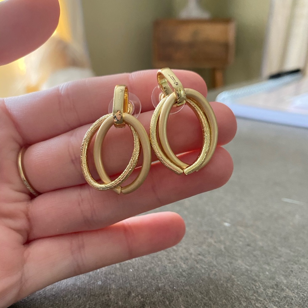 Gold oval dangle earrings